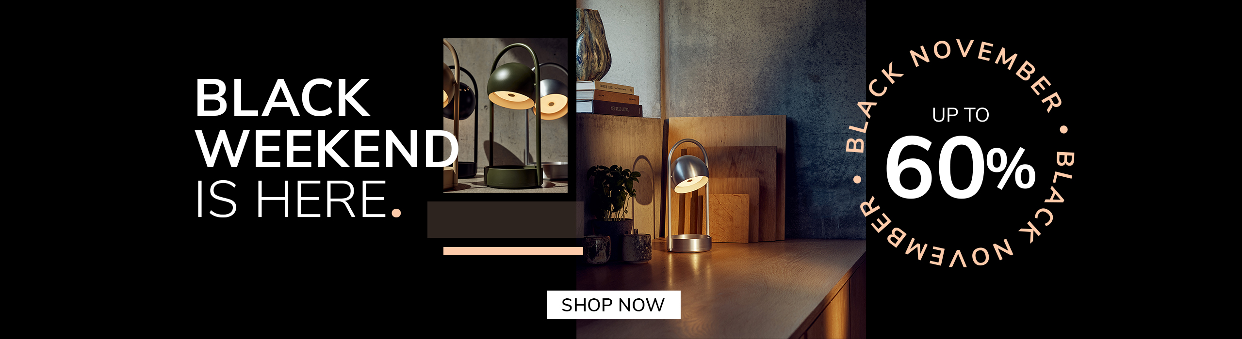 Save now Modern silver table lamp glowing on a wooden desk with cutting boards and plants in the background. Promotional text reads: ‘Black Weekend is here. Up to 60%. Black November.’ A button says ‘Save Now.’