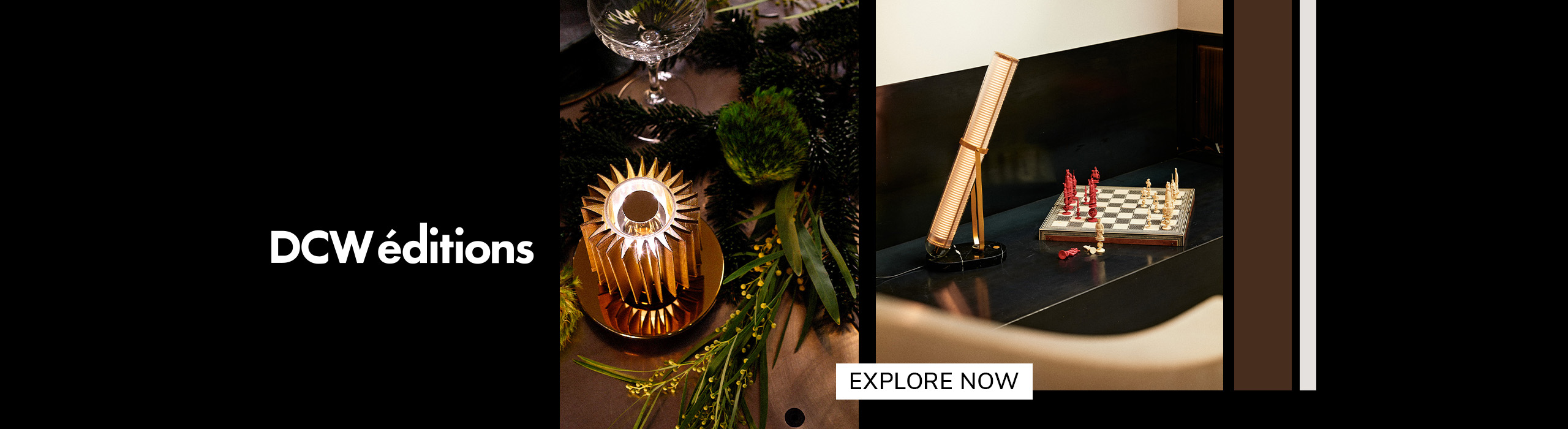 Explore now Elegant DCW éditions lighting displayed on a festive table and beside a chessboard, featuring modern sculptural lamps in warm tones with text ‘Explore Now’.